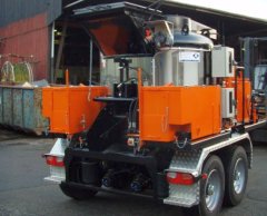Changeable lifting frames with gussasphalt mixer and joint material mixer or tool and machinery container.